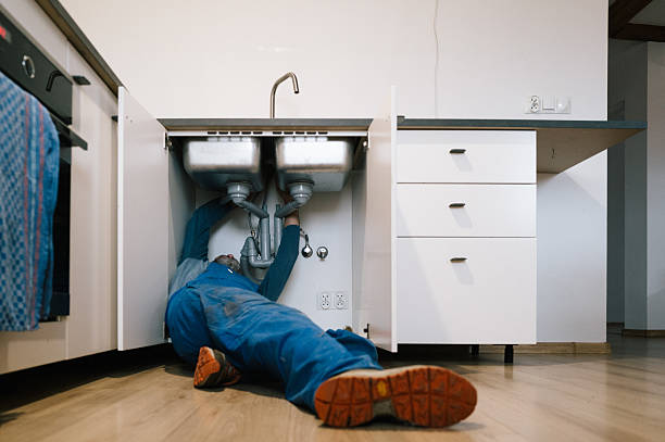 Professional Emergency Plumber technician working in Rising Fawn, GA